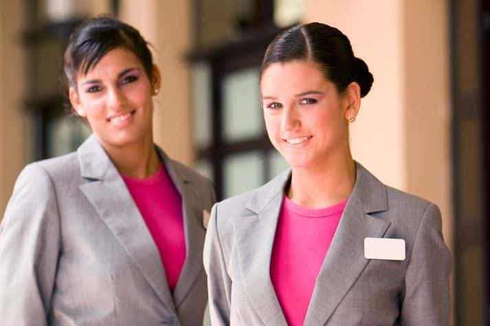 innovative conference sponsorship showing two hostesses at the door of a restaurant