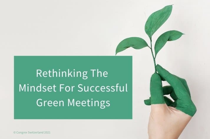 green meetings blog title image showing a hand painted green holding a seedling